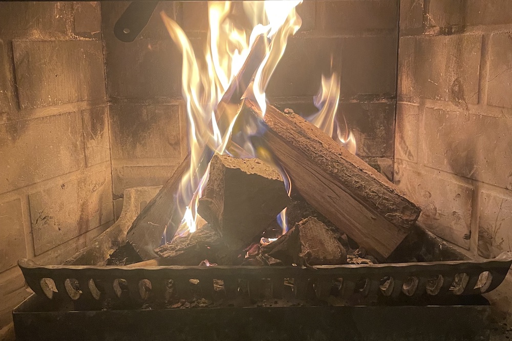 a lit wood burning fire